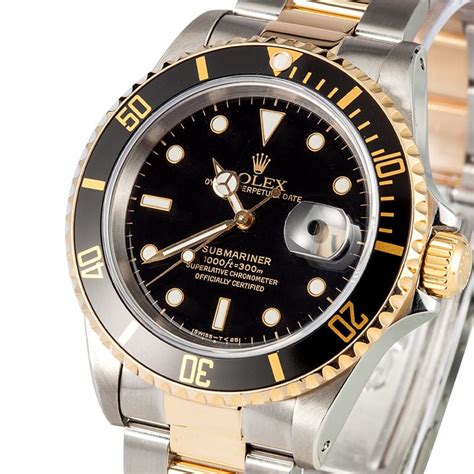 rolex oyster submariner watch black and gold face|Rolex Submariner best price uk.